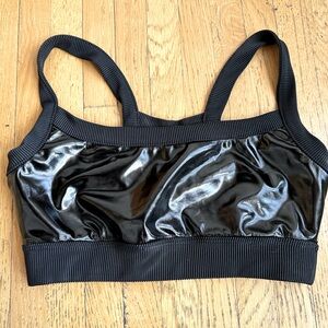 Black shiny sports bra from heroine sport